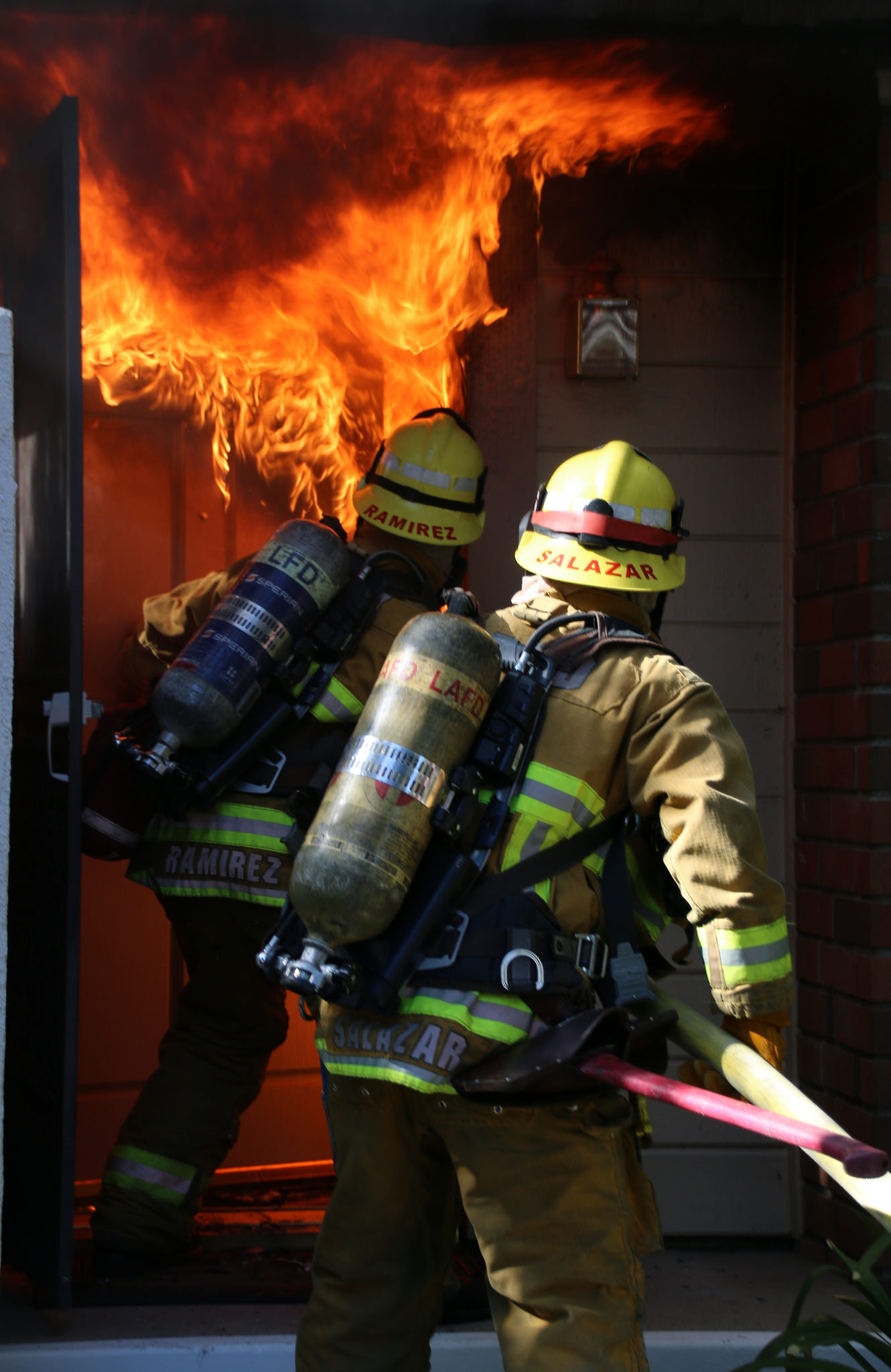 Firefighters make way into unit with heavy fire