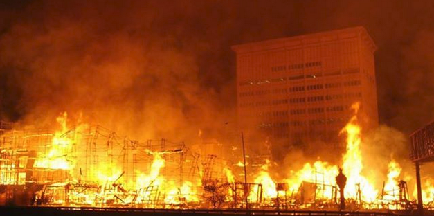 Huge wood framed structure ablaze.