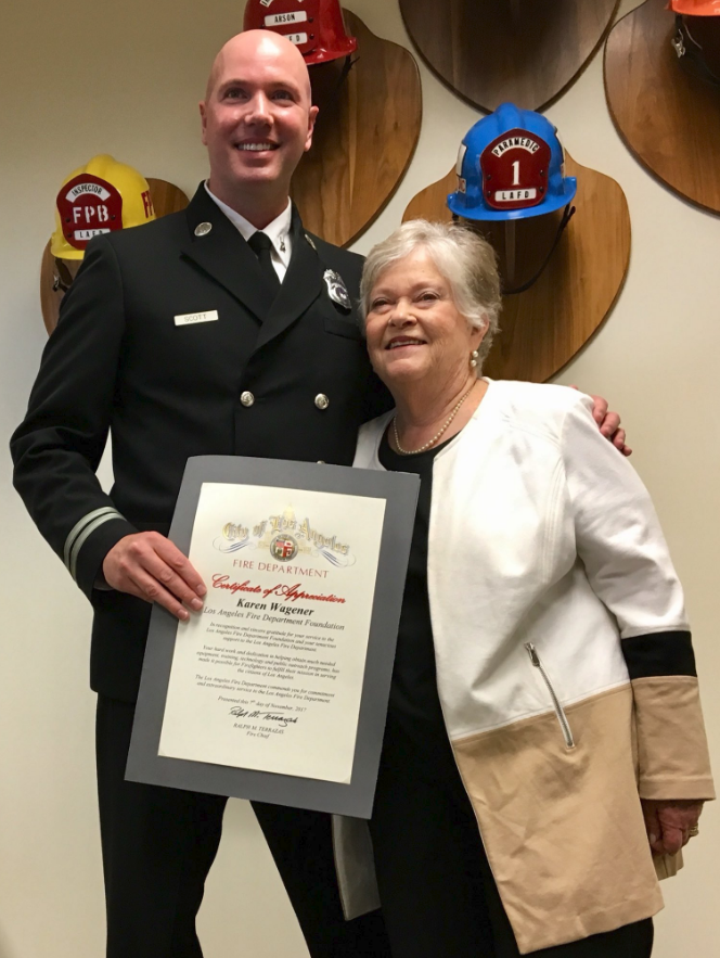 LAFD Foundation President Karen Wagener (R) with LAFD Captain Erik Scott