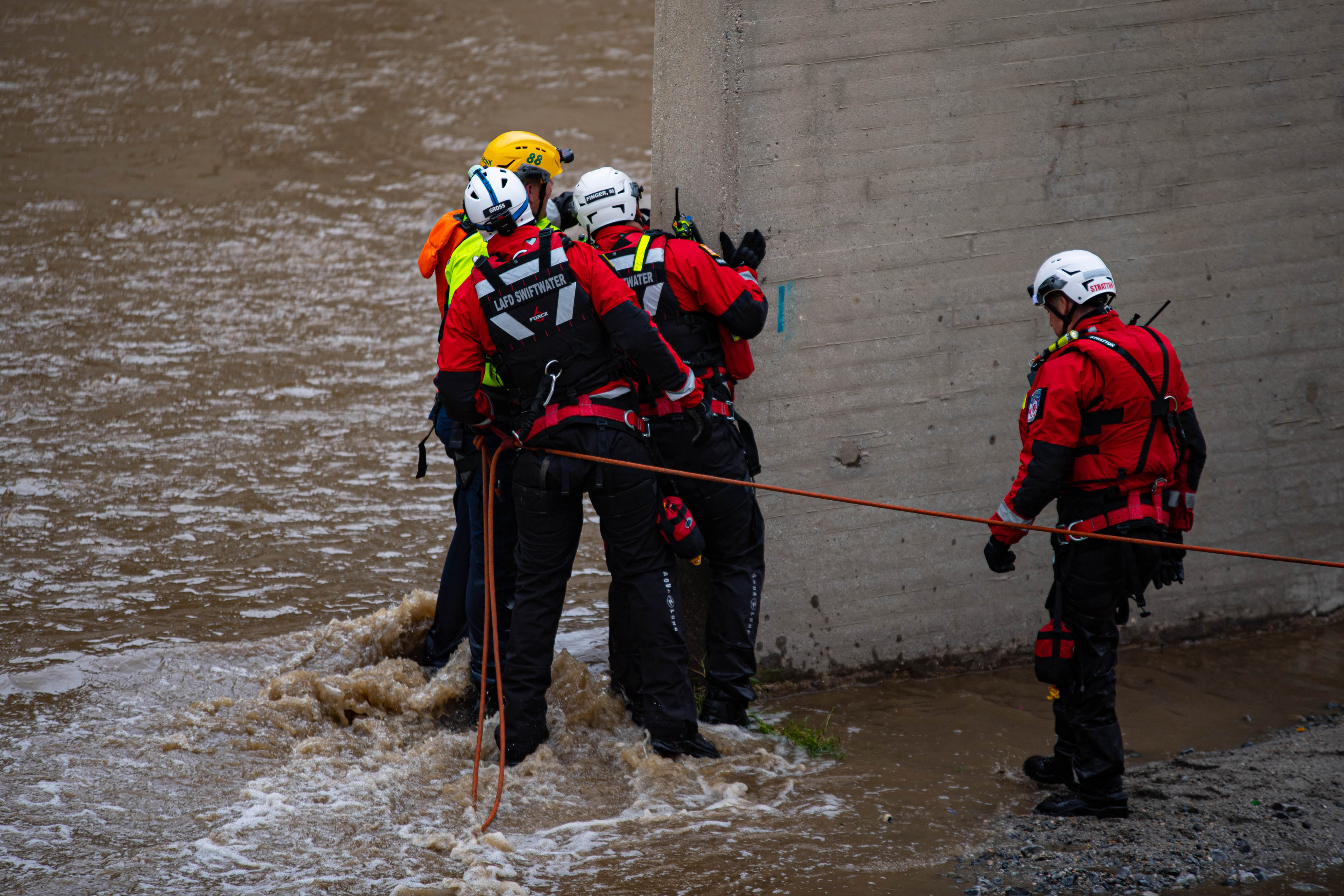 Firefighters waiting for the dog