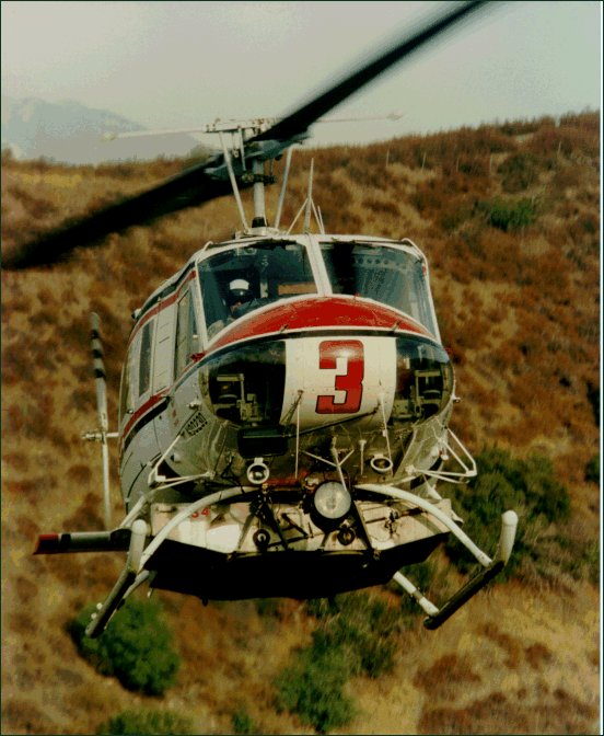 LAFD Helicopter in the air with pilot visible