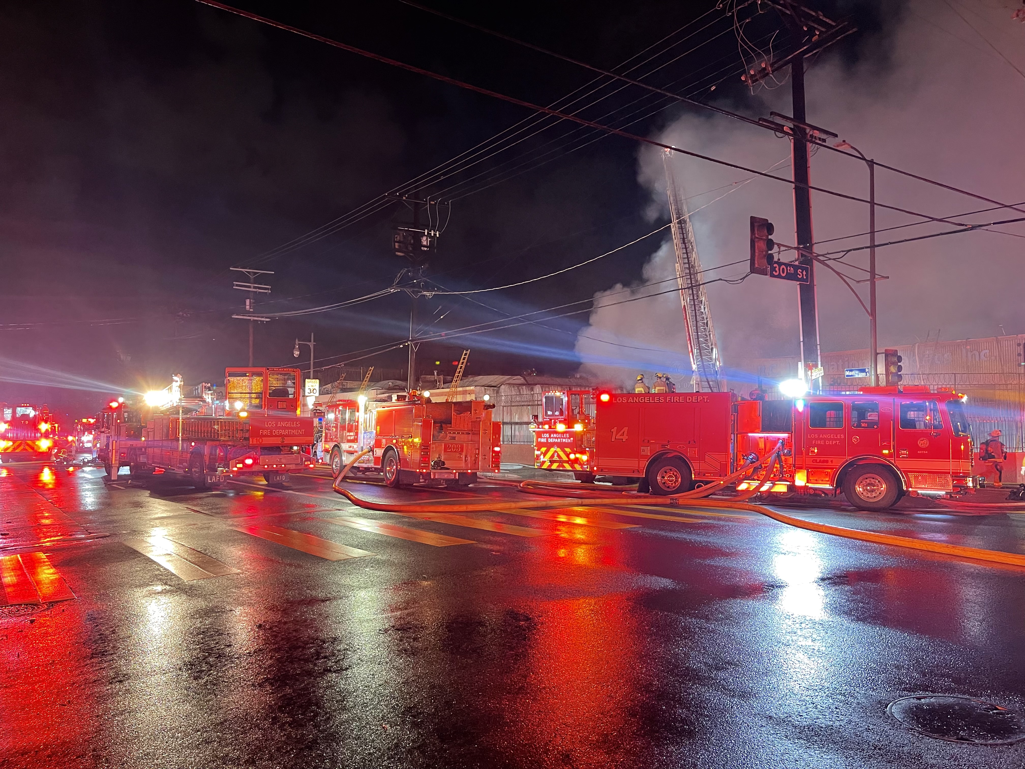 Fire engines in the street in front of structure fire